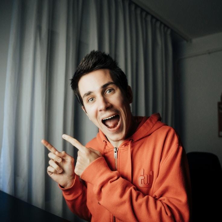 Riley Chen, Client Relations Director, discussing corporate gifting strategy with business clients